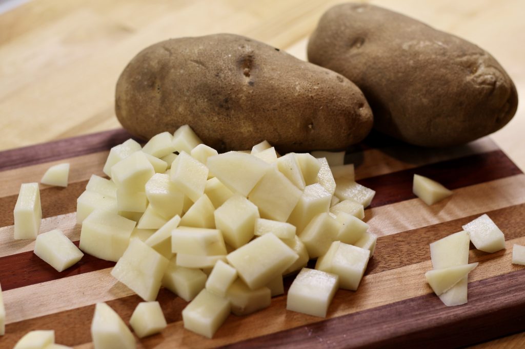 Crispy Skillet Potatoes on the cutting board