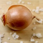 Onion surrounded by frozen onions