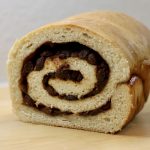 Sourdough Cinnamon Raisin Bread baked and sliced on the end