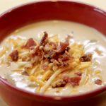 Loaded Potato Soup in a red bowl