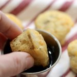 Sourdough McGriddle Bites being dipped in syrup