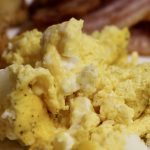 Oven Scrambled Eggs on the plate with bacon and French toast