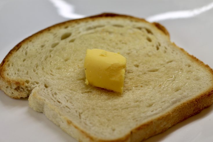 toast with butter churned in a mixer on top