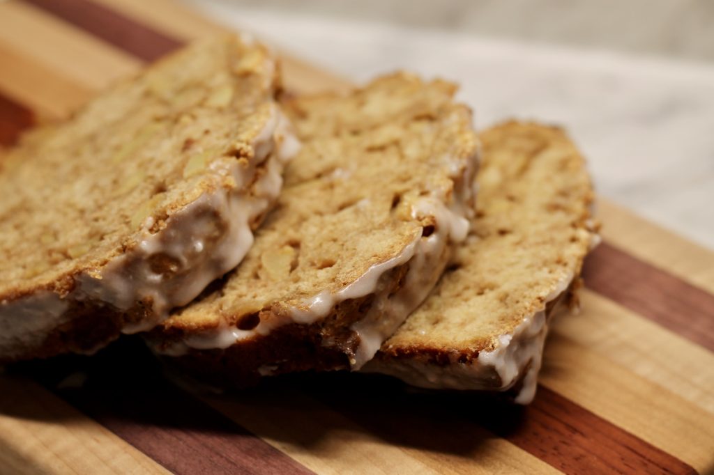 Sourdough Discard Apple Bread slices on a cutting board